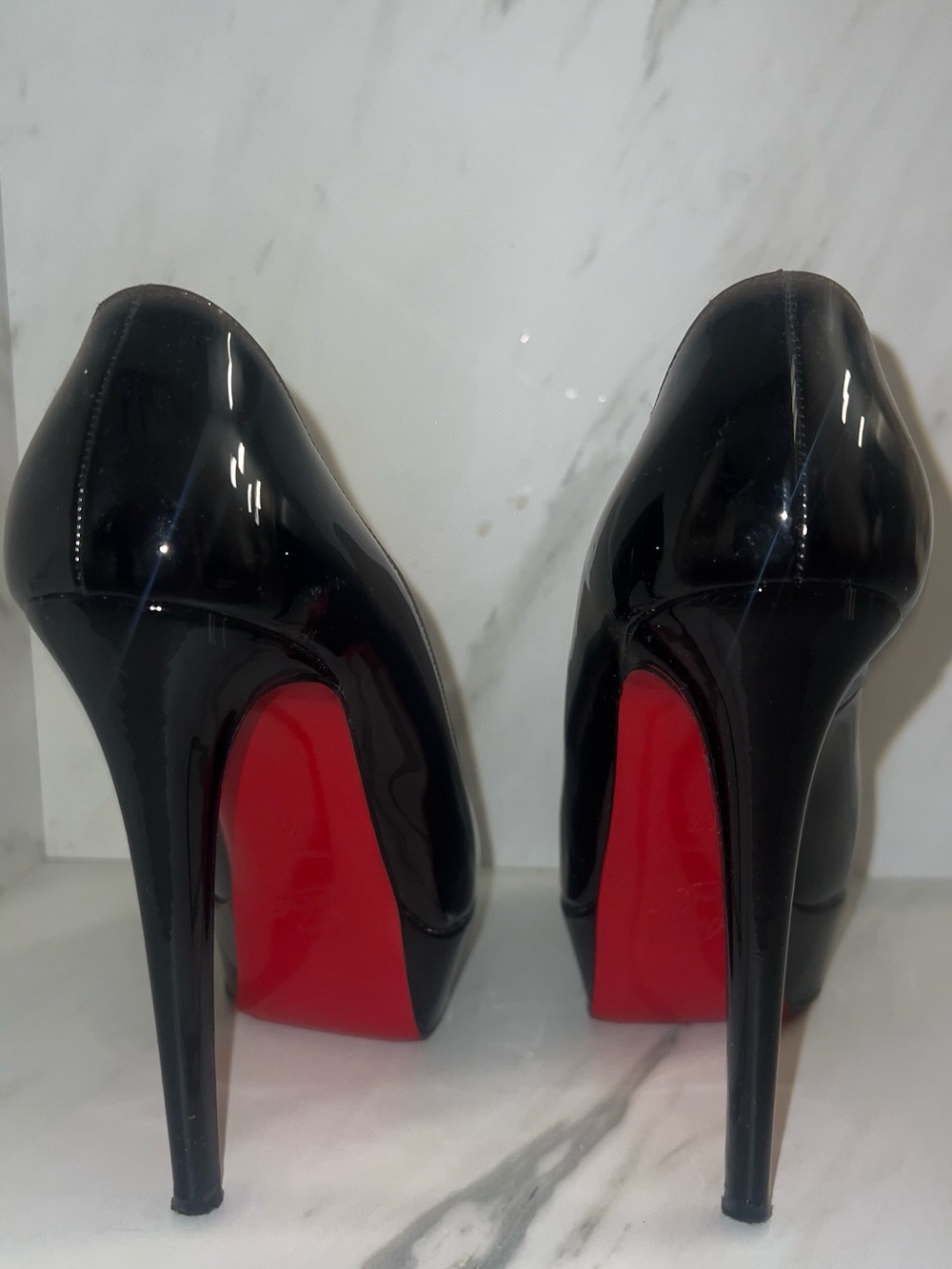 Christian Louboutin Black Patent Pumps with Signature Red Soles